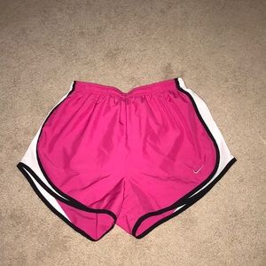 Pink Nike running shorts
